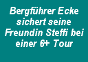 Bergf&uuml;hrer Ecke sichert seine Freundin Steffi bei einer 6+ Tour